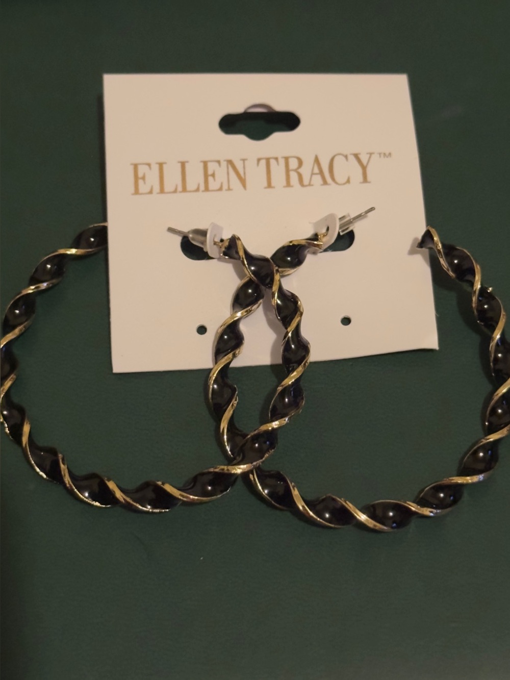 NWT Ellen Tracy Black and Gold Twisted Hoop Earrings. 2”L x 2 1/2”W.
